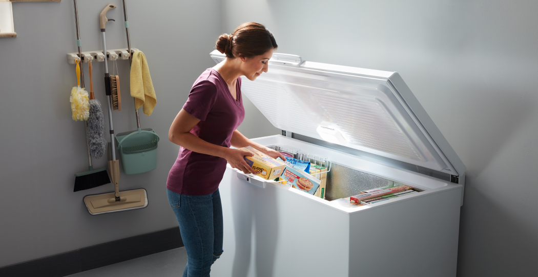 photo of whirlpool-chest-freezer-woman